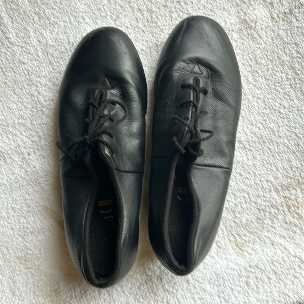 Boch tap shoes.  Superficial scuff marks on top as shown.